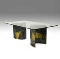 Paul evans dining table with plate glass top over two crescentshaped patinated and welded steel bases unmarked 30 x 84 x 44