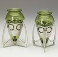 Archibald knox liberty  co pair of tudric pierced pewter vases original james powell green glass liners unmarked 6 34 x 4 12