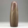 Van briggle tall fine and early vase with leaves red and brown matte glaze 1903 professional restoration to drilled hole on bottom and 6 hairline from rim aa van briggle 1903 over restoration