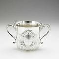 American silver presentation trophy cupwine cooler howard  co ny ca 1893 bulbous halfreeded with scroll and foliate framed inscribed cartouche two curved handles 335 ot 6 12 x 11 over
