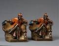 A Pair of Cast Metal Figural Bookends