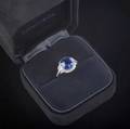 Important tiffany  co diamond  sapphire ring rectangular cushion cut blue sapphire approx 450 cts 968mm x 883mm x 647mm framed by a line of circular cut diamonds to shoulders of graduate