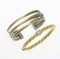 David yurman gold bracelets gold and diamond hinged cable bracelet and gold and silver threerow crossover cuff 18k hinged bracelet with approx 40 ct diamonds 236 gs 2 x 1 58 cuff 537 gs