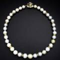 South sea pearl and diamond necklace 18 strand of multihued spherical pearls 145mm105mm ten gold and diamond rondelles and a colorless and fancy color diamond clasp diamonds approx 375 cts