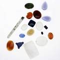 Collection of unmounted hardstones numerous cabochons tablets beads etc include carnelian agates malachite onyx etc with a bag of antique beads approx 2900 gs gw