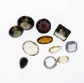 Collection of faceted gemstones removed from antique jewelry various sizes and shapes include amethyst natural and synthetic ruby natural and synthetic spinel citrine garnets etc approx 3200