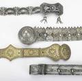 Russian or turkish niello or gilt silver belts four belts ca 1900 the largest 84 silver zakar abdulayev vladikavskas embossed links over leather boss buckle obscures a niello figure 2 12 x