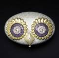 Judith leiber silver owl minaudiere oval form with large gilt metal and pink crystal eyes centered by carnelian accents on fluted mother of pearl gold leather interior original purse comb and mirro