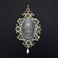 W bauscher enameled gold and moonstone pendant 14k yg carved moonstone mask and four blue sapphires in the renaissance style ca 1985 signed 173 gs 3 x 1 12