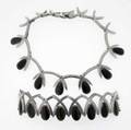 Antonio pineda silver and obsidian suite 970 silver ca 1960 necklace and bracelet with teardrop shaped obsidian cabochons and crossed arched silver links necklace y569y 15 12 x 1 12 bracel