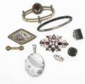 Gold etruscan revival bracelet and other 19th c jewelry nine pieces of either gold gf or silver 18k yg hinged bangle with granulations and carnelian scarab marked roma hungarian porcelain miniatu