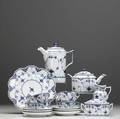 Seventeenpiece royal copenhagen blue onion service 19th20th c includes coffee and teapots sugar and creamer six cups and saucers and cake plate teapot handle broken tallest 8 12