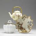 Three pieces of royal worcester 19th c golddecorated teapot covered cracker jar and a floral decorated bowl tallest 7 12