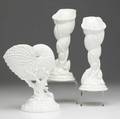 Three royal worcester shellform flower holders in white porcelain 20th c tallest 9