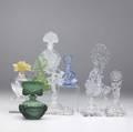 Nine figural glass perfume bottles 20th c daum france clear bulbous base with an amber flower czechoslovakia cut and etched glass with a pair of flamenco dancers and one frosted glass with cherubs