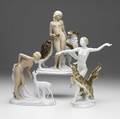 Three porcelain nude figurines all 20th c hutschenreuther with cougars german figures with deer or wolfhound tallest 10 12