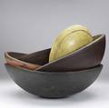 Five wood mixing bowls 19th c in various sizes including ones in red salmon blue and yellow paint largest 18 34 x 6 12