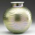 Green and gold iridescent glass vase in the style of durand king tut early 20th c unsigned 8