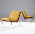 Peter hvidt pair of boomerang lounge chairs with teak and brass frames and plaidupholstered fabric cushions marked with danish control metal tag 30 x 23 12 x 25 12