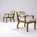 Decorative pair of egyptianstyle oak armchairs with tufted beige fabric upholstery 33 14 x 21 12 x 28