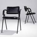 Jacques adnet pair of folding chairs upholstered in stitched black leather on black enameled metal bases 29 14 x 22 14 x 16 14