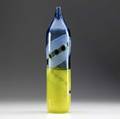 Anzolo fuga  avem tall incalmo glass bottle in yellow and blue with swirl of white netting and red and green murrines 19 14