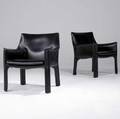 Mario bellini  cassina pair of cab lounge chairs with stitched black leather upholstery cassina paper labels 31 x 26 12 x 22