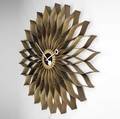 George nelson  howard miller large sunflower clock in bentwood with brass accents and enameled metal hands howard miller label 29 34 dia