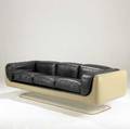 Steelcase threeseat sofa upholstered in black leather with fiberglass shell on lucite base steelcase label 25 x 81 12 x 33 12
