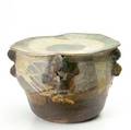 Toshiko takaezu ceramic vessel with modeled buttresses under a flattened top in brown glazes signed tt 12 x 16 12