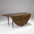 George nakashima  widdicomb dropleaf dining table in sundra finish with bookmatched top and keyed throughtenon stretcher widdicomb decal closed 28 12 x 73 14 x 36 14 leaf 26