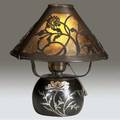 Heintz sterlingonbronze boudoir lamp in the poppy pattern overlaid on the base and pierced on the shade the latter lined in mica stamped ovington chicago new york 9 12 x 8 12