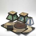Arts  crafts accessories seven items three faceted lamp shades heintz sterling on bronze cigarette box cordoba shops tooled leather circular mat roycroft desk blotter and three glass lined coppe