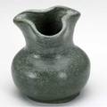 Merrimac small vase with lobed opening covered in matte green glaze stamped merrimac with fish 4 12 x 4