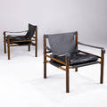 Arne norell pair of safari chairs in solid rosewood with black leather upholstery and brass hardware 29 34 x 27 x 26