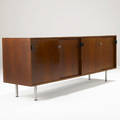 Florence knoll  knoll walnut credenza with fourdoors concealing fitted drawers and adjustable shelves on chromed steel legs 21 14 x 71 12 x 18 12