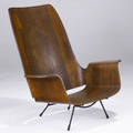 Style of luther conover low lounge chair with laminated plywood shell on wrought iron base 38 12 x 35 12 x 21 12