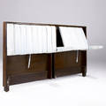 Edward wormley  dunbar king headboard in dark mahogany with retractable armrests and tilting pillow rests upholstered in striped vinyl green and black dunbar tag 41 14 x 81 14 x 19