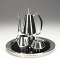 Gio ponti  reed  barton fourpiece diamond pattern sterling silver coffee service including coffee pot with black canewrapped handle cream pitcher sugar dish and tray with black laminate center