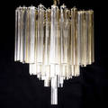 Venini chandelier with alternating clear and amber circular and triangular crystal drops on a fivetiered frame 23 x 21 dia