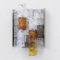 Venini three chromed steel wallhanging sconces with amber brown and clear cast glass block prisms along with a fourth frame and six prism components each sconce 16 x 11 14