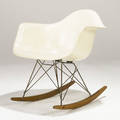 Charles and ray eames  herman miller rocking chair with fiberglass shell paper label 26 12 x 24 12 x 27 14