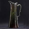 Roseville rozane royal dark 15 pitcher painted with green grapes glazed over firing line to base of handle rozane medallion