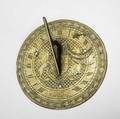 Brass sundial inscribed dieu et mon droit 1696 nox venit etched roman numerals and royal coat of arms with lion and unicorn 9 34 dia