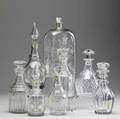 English decanters grouping of eight includes birddecorated etched decanter ca 17401750 together with seven others dating from the late 18thearly 19th c largest 5 14 x 3 12 x 12 12