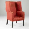 English wing chair upholstered in red silk on casters 19th c 26 x 27 x 52
