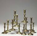 English brassbell metal candlesticks six pairs in various styles and designs 18th c tallest 9 34