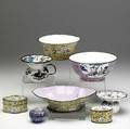 Chinese enamels eight pieces comprising three bowls three boxes and two spittoontype receptacles all 18th c damage andrestoration to each largest 9 12 x 8 x 2 12