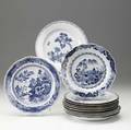 Chinese export grouping of twelve blue and white plates late 18thearly 19th c largest 9 dia