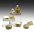Ivory netsuke eight figurines include frogs snakes clams insects etc some signed tallest 2 38